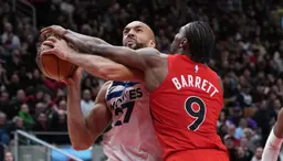 Rudy Gobert face à RJ Barrett et les Toronto Raptors, avec Minnesota